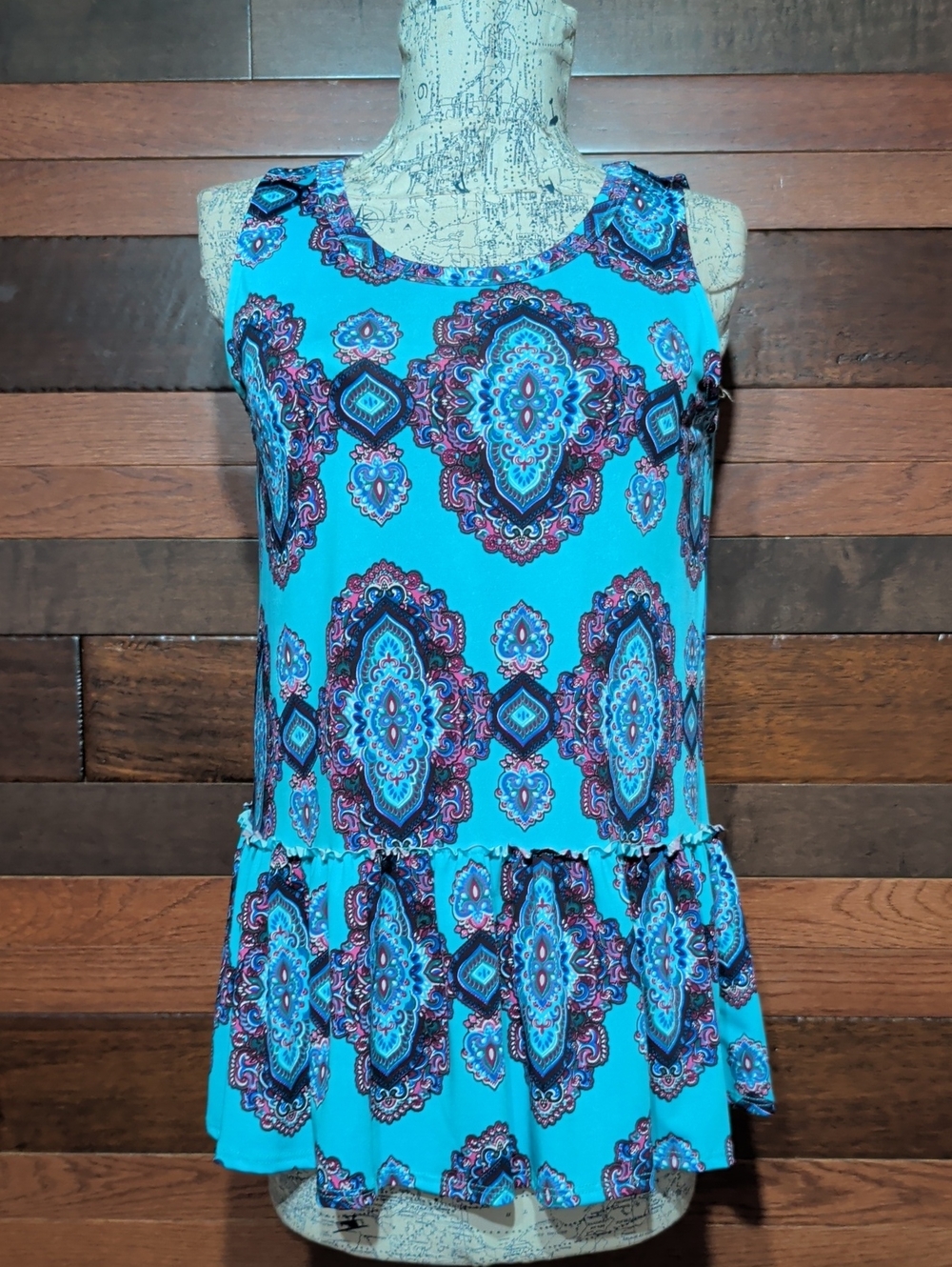 Agnes & Dora Turquoise Sleeveless Peplum Top with Paisley Medallion Print